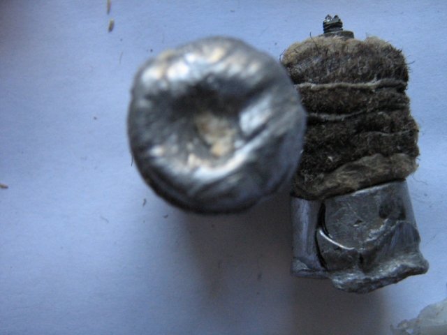 Пуля "NikA" после 200 мм сосновых досок