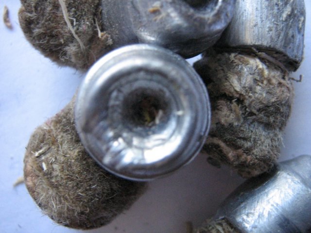 Пуля "NikA" после 200 мм сосновых досок - экспансивность не работает по доскам.